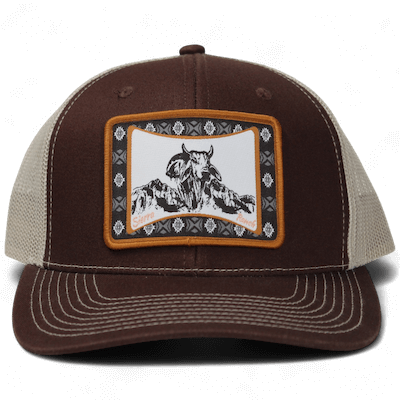 trucker hat with western themed woven patch