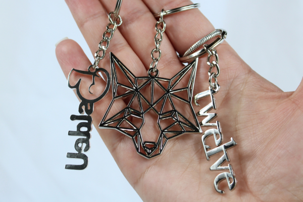 lot of three die cast keychains