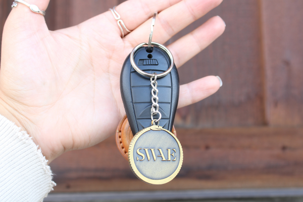 die struck keychains on keys