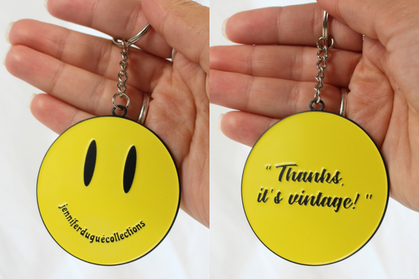 smiles two sided metal keychain