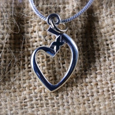 cast silver charm