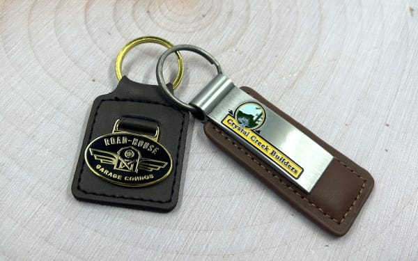 Two keychains with metal attachment examples